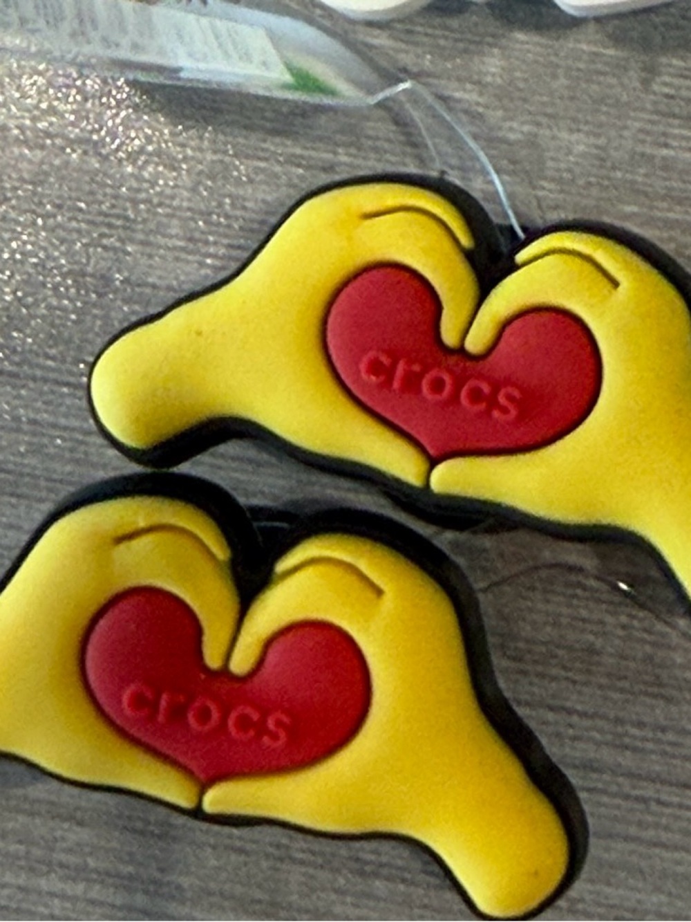 CROCS Yellow Hands with Red Heart Jibbitz Pair